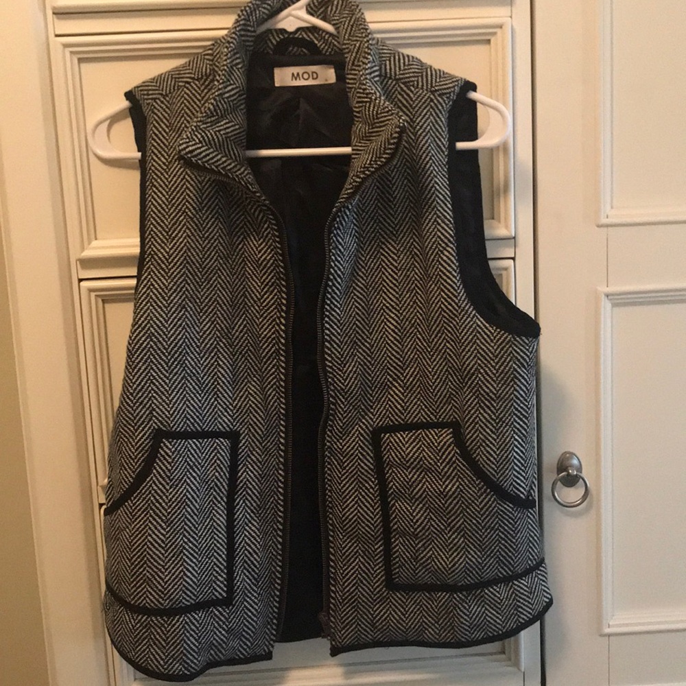 Black and white vest
